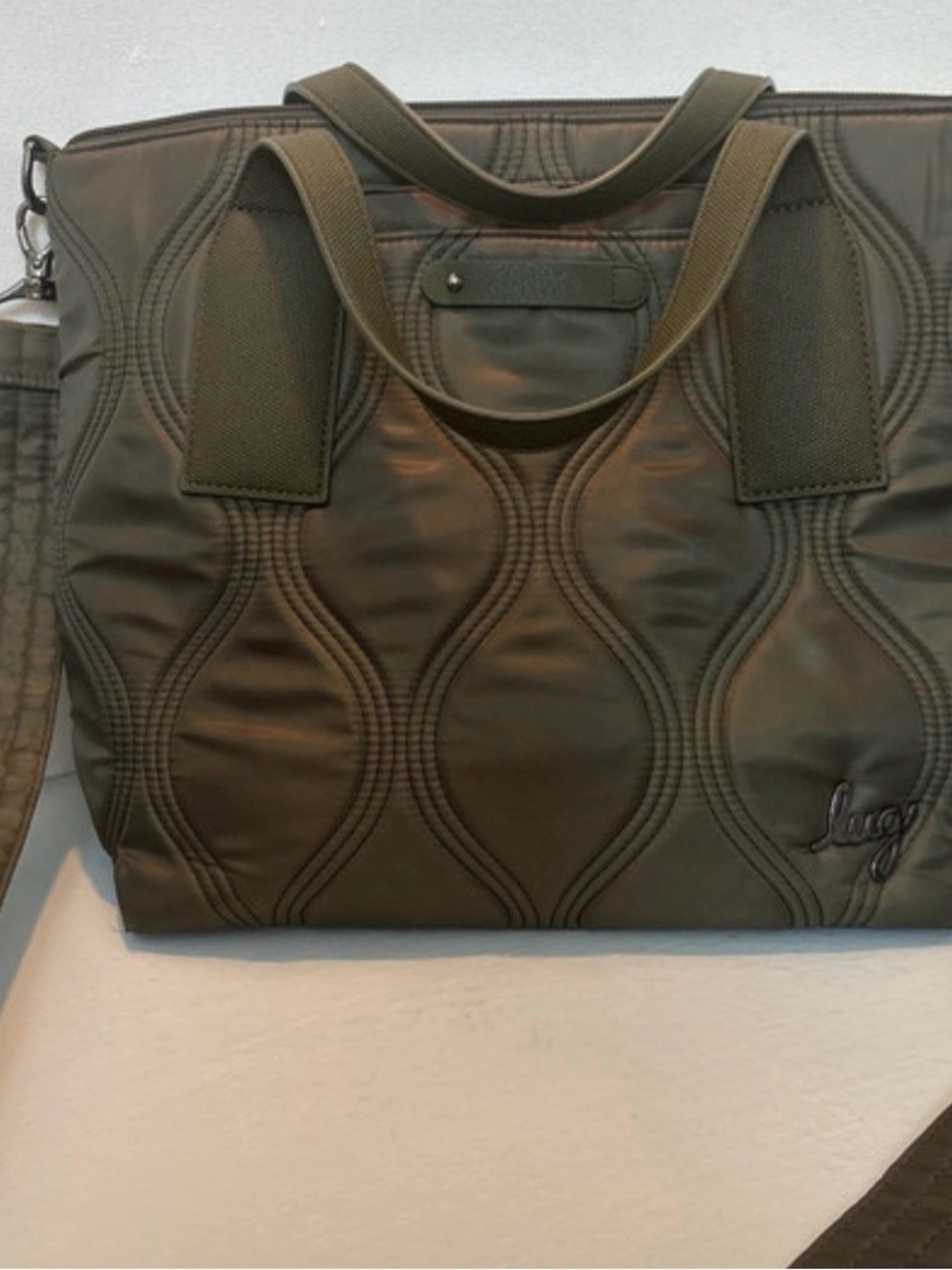 Lug Quilted Travel crossbody tote with beautiful floral print pattern